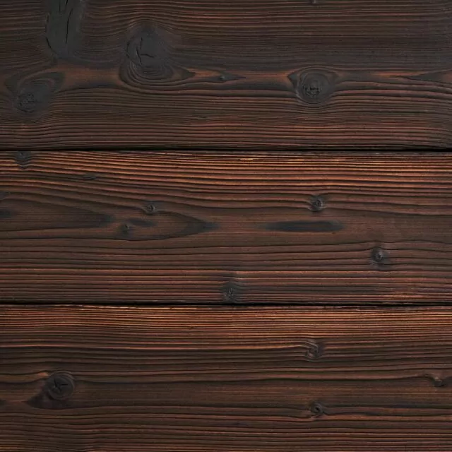 Malimetin hiilletty terassilauta (mänty). Väri: Teak.